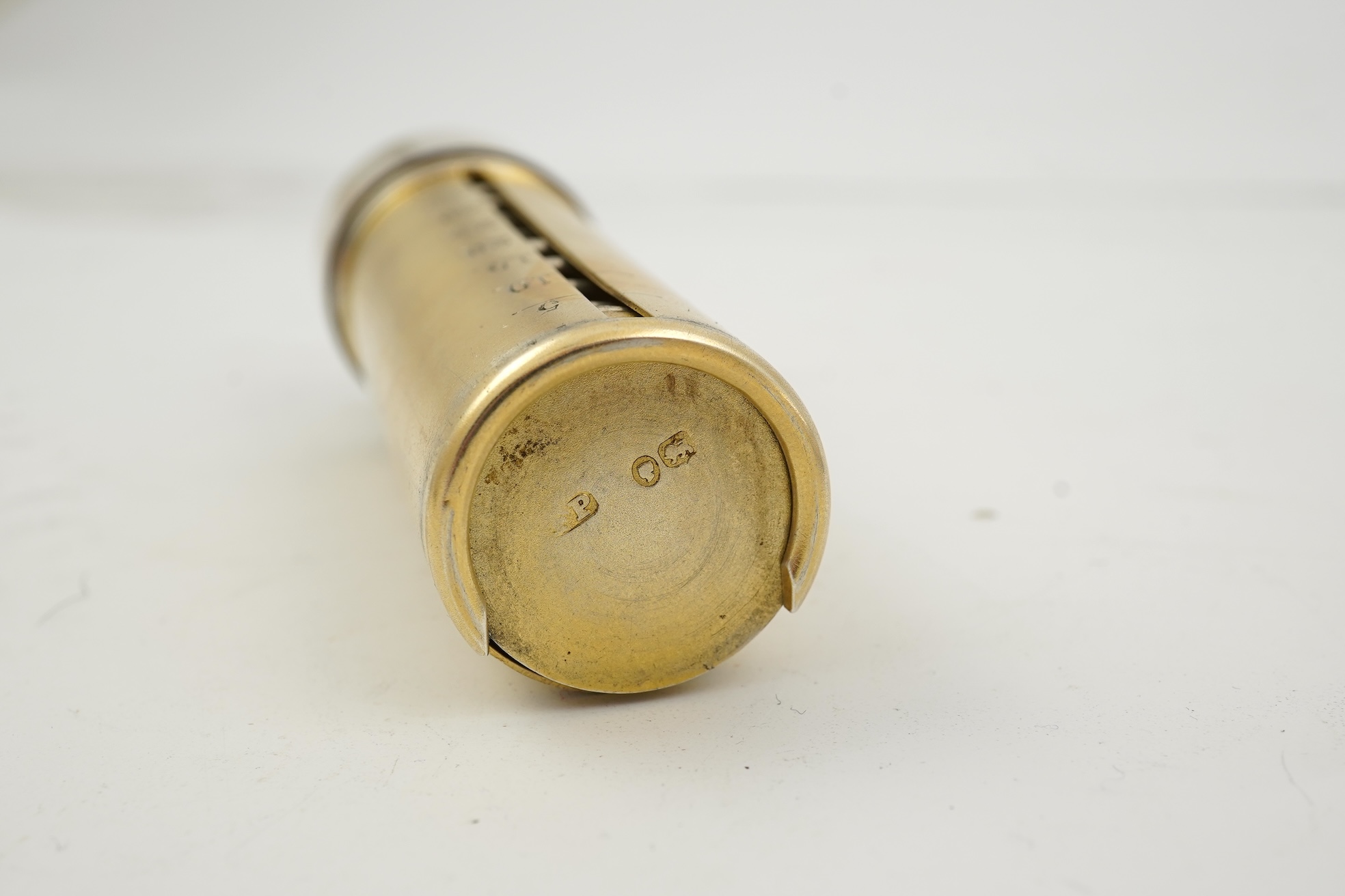 A late Victorian parcel gilt silver tubular coin holder, by Frederic Purnell